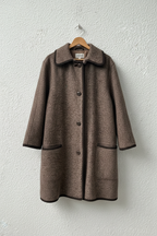 Cappotto tweed beige bordure scure su gruccia