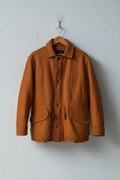 Giacca pelle arancio cognac zip bottoni ottone su gruccia